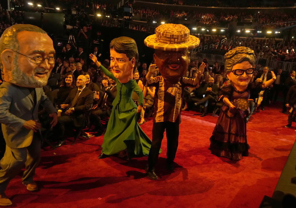 Dancers perform in costume with Bad Bunny at the 65th annual Grammy Awards on Sunday, Feb. 5, 2023, in Los Angeles. (AP Photo/Chris Pizzello)