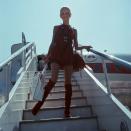 <p>Twiggy makes a case for fringe with the absolute coolest airport style.</p>