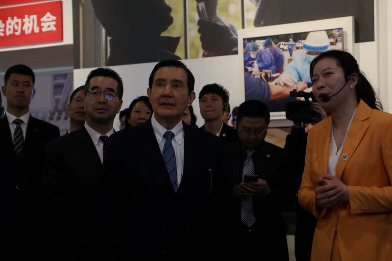 Former Taiwanese president Ma Ying-jeou visits an exhibition on how China fought against the coronavirus disease (COVID-19), in Wuhan