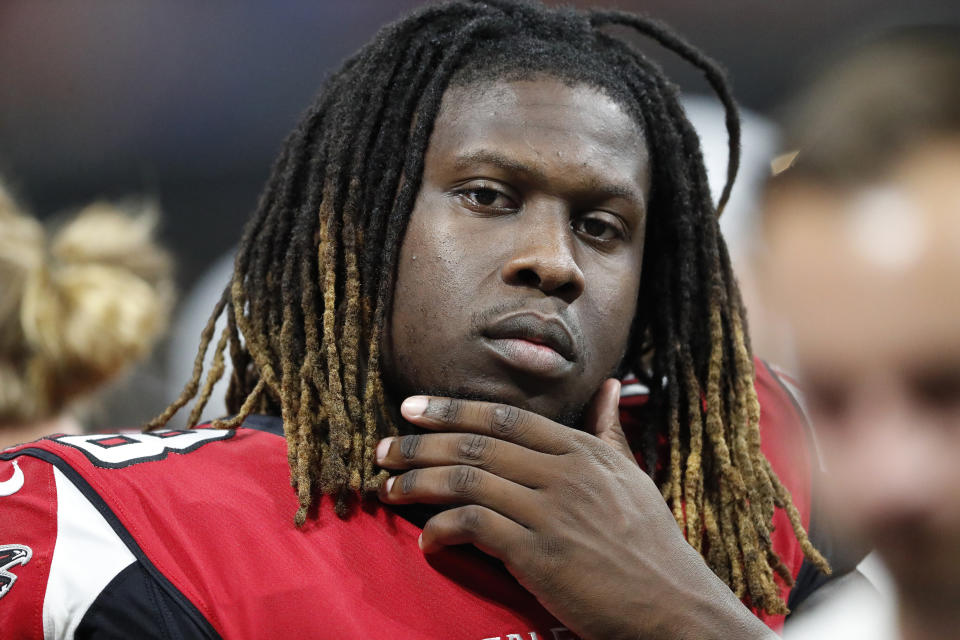 Atlanta Falcons defensive end Takk McKinley (98) sits on the bench during the second half of an NFL preseason football game against the Kansas City Chiefs, in Atlanta. Falcons defensive end Takk McKinley is with a family member in Oakland after undergoing a mental evaluation prompted by a friend’s call to Los Angeles police. Falcons spokesman Brian Cearns told The Associated Press McKinley “is in a good spot” and has been in “constant communication” with the team, including coach Dan Quinn. Cearns said McKinley is with an uncle in Oakland.(AP Photo/John Bazemore, File)
