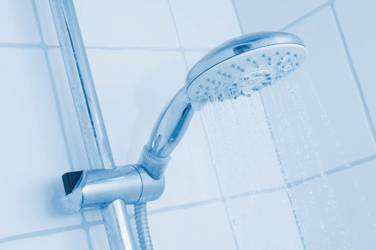 Reducing the length of a shower from eight minutes to five can save hundreds of pounds per year (Alamy/PA)