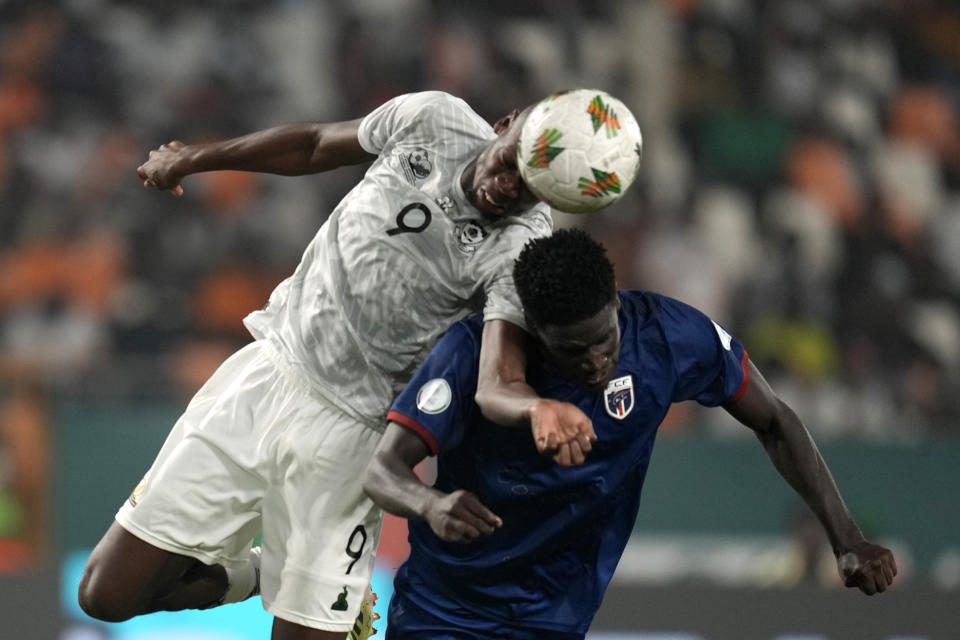 South Africa's Evidence Makgopa, left, heads the ball as Cape Verde's João Paulo Fernandes challenges him during the African Cup of Nations quarter final soccer match between Cape Verde and South Africa, at the Charles Konan Banny stadium in Yamoussoukro, Ivory Coast, Saturday, Feb. 3, 2024. (AP Photo/Themba Hadebe)