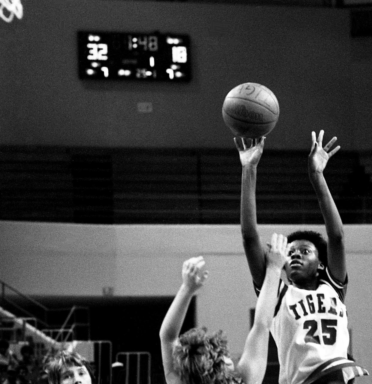 Lisa Caruthers, Pearl High (1977-80): Here, Caruthers (25), now a member of Tennessee State University, is set for a shot against Bethel in TSU's season opener at Gentry Center on Nov. 18, 1982.