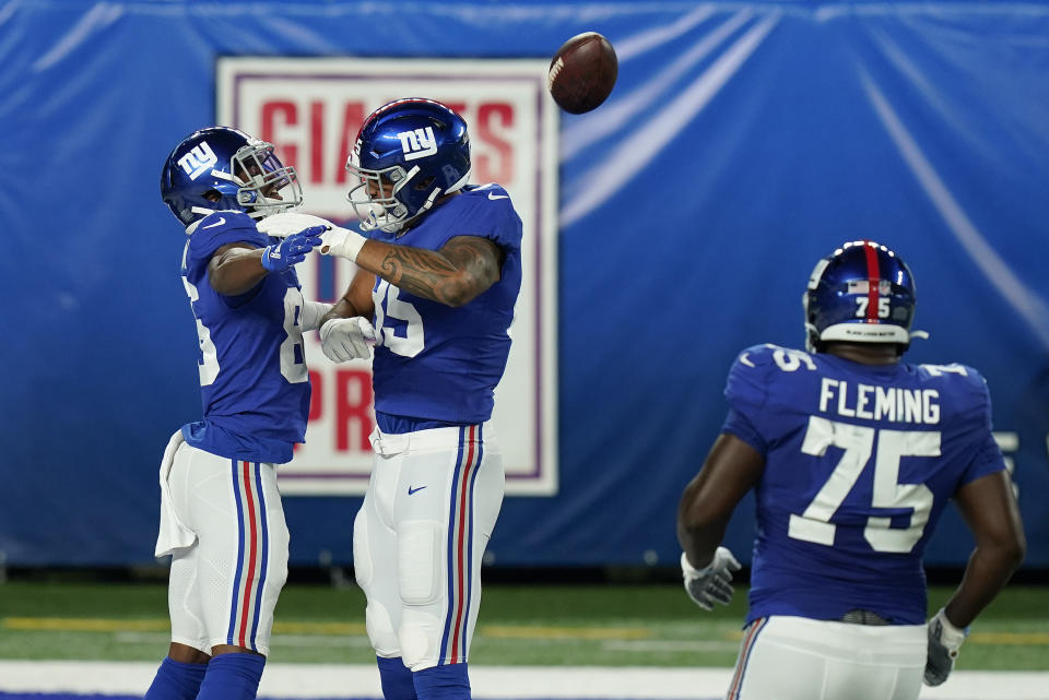 New York Giants wide receiver Darius Slayton (86), far left, celebrates with teammates after scoring touchdown against the Pittsburgh Steelers during the second quarter of an NFL football game Monday, Sept. 14, 2020, in East Rutherford, N.J. (AP Photo/Seth Wenig)
