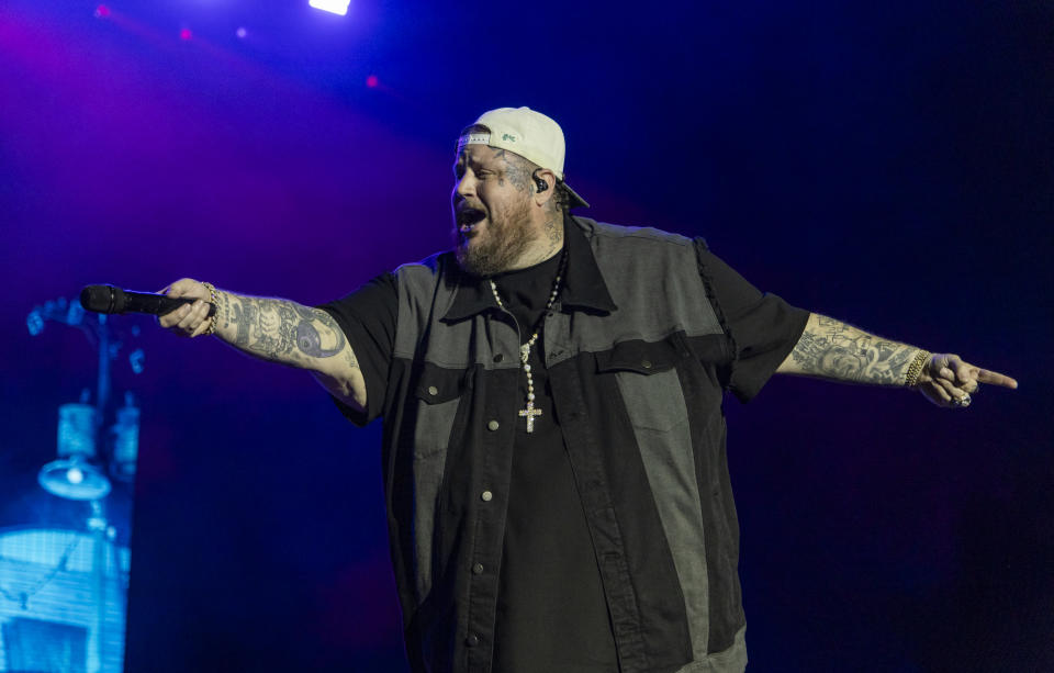 Jelly Roll sings onstage.