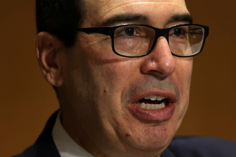 FILE PHOTO: Treasury Secretary Steven Mnuchin testifies during a hearing in Washington