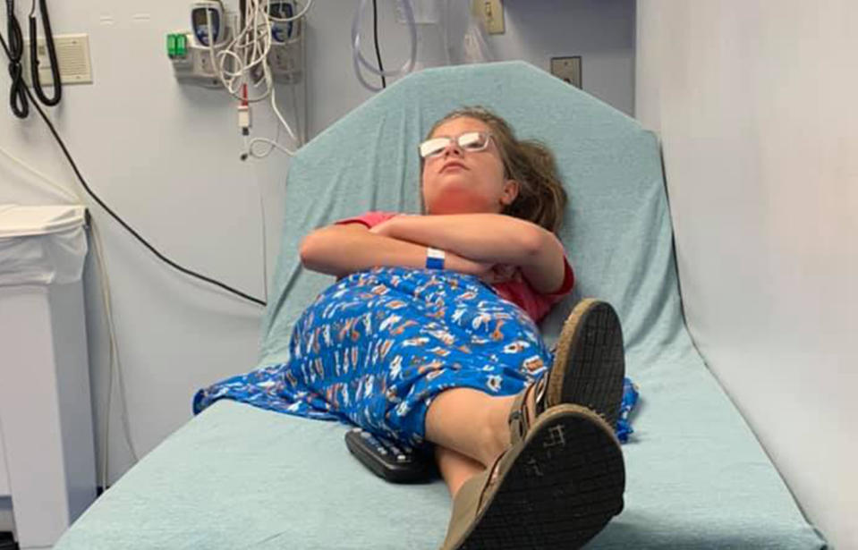 Gracie Brown, 10, was diagnosed with hair grooming syncope. She is pictured here in a hospital bed.