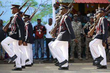 Members of the Haitian Armed Forces (FAD'H) parade in the streets of Cap-Haitien, Haiti, November 18, 2017. REUTERS/Andres Martinez Casares