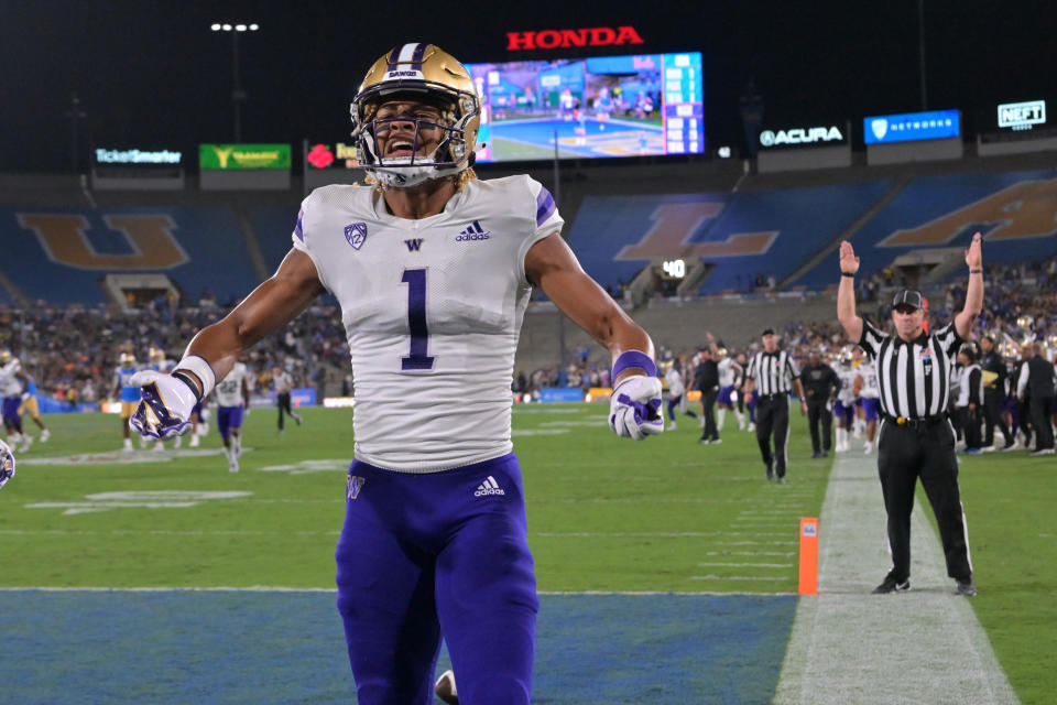 Sep 30, 2022; Pasadena, California, USA; Washington Huskies wide receiver Rome Odunze (1) celebrates after a touchdown in the first quarter against the UCLA Bruins at the Rose Bowl. Mandatory Credit: Jayne Kamin-Oncea-USA TODAY Sports