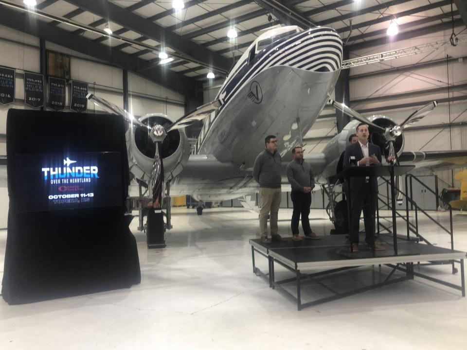 Sean Dixon, president of Visit Topeka, spoke Wednesday while standing in front of a vintage Douglas DC-3 airliner at a news conference in a Vaerus Aviation hangar at Forbes Field to announce an upcoming Topeka air show featuring the U.S. Air Force Thunderbirds.