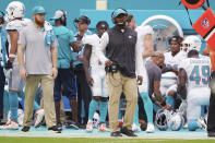 Miami Dolphins head coach Brian Flores walks the sidelines during the second half of an NFL football game against the Buffalo Bills, Sunday, Sept. 19, 2021, in Miami Gardens, Fla. The Bills defeated the Dolphins 35-0. (AP Photo/Hans Deryk)