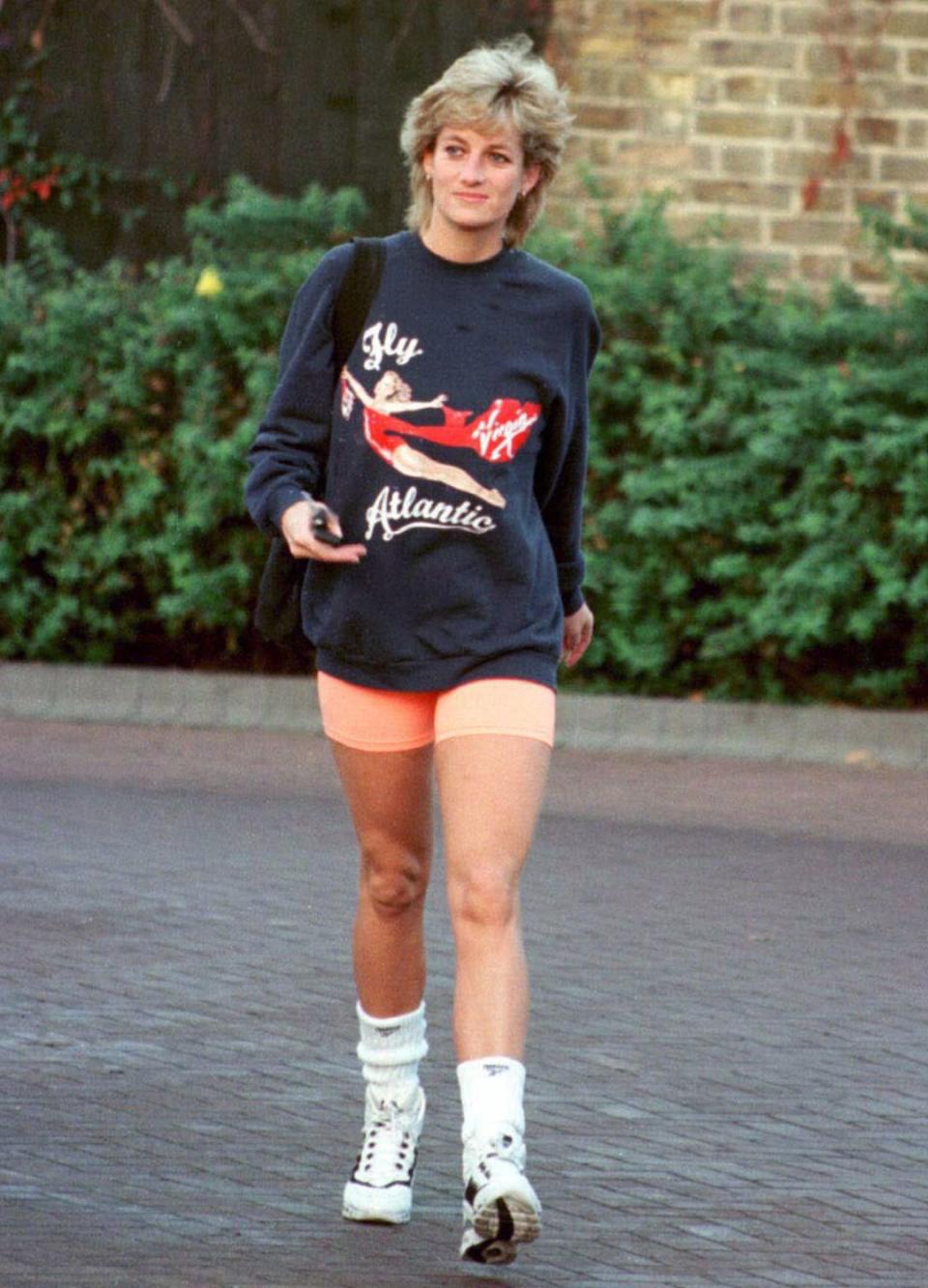 LONDON - NOVEMBER 1995: Princess Diana, Princess of Wales, wearing Virgin Atlantic sweatshirt, leaves Chelsea Harbour Club, London in November, 1995. (Photo by Anwar Hussein/WireImage)