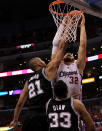 LOS ANGELES, CA - MAY 19: Tim Duncan #21 of the San Antonio Spurs blocks a shot by Blake Griffin #32 of the Los Angeles Clippers in Game Three of the Western Conference Semifinals in the 2012 NBA Playoffs on May 19, 2011 at Staples Center in Los Angeles, California. The Spurs won 96-86 to take a three games to none lead in the series. NOTE TO USER: User expressly acknowledges and agrees that, by downloading and or using this photograph, User is consenting to the terms and conditions of the Getty Images License Agreement. (Photo by Stephen Dunn/Getty Images)