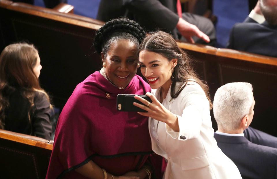 <p>Rep. Alexandria Ocasio-Cortez takes a photo with Rep. Sheila Jackson Lee.</p>