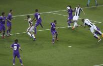<p>Juventus’ Giorgio Chiellini jumps for the ball during the Champions League Final soccer match between Juventus and Real Madrid at the Millennium Stadium in Cardiff, Wales </p>