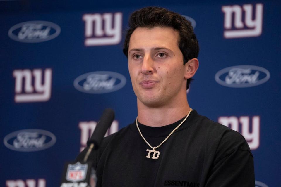New York Giants quarterback Tommy DeVito speaks to reporters following an NFL football against the Dallas Cowboys, Sunday, Nov. 12, 2023, in Arlington, Texas. The Cowboys won 49-17. (AP Photo/Julio Cortez)