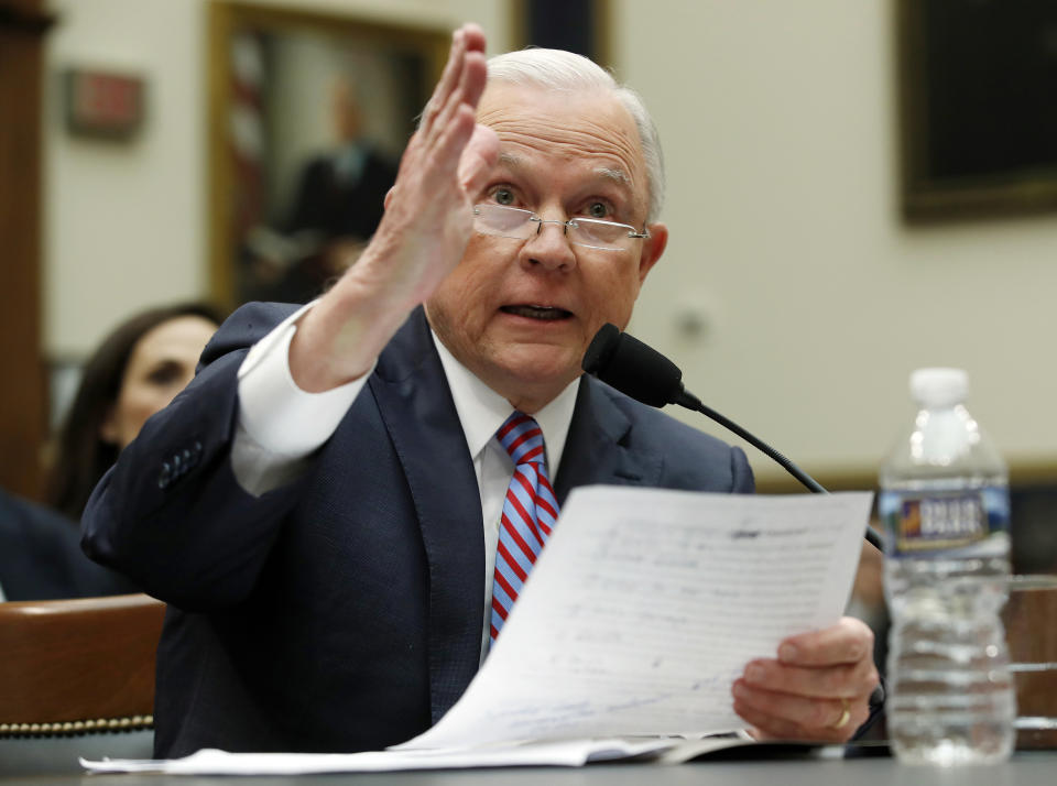 FILE - In this Nov. 14, 2017, photo, then Attorney General Jeff Sessions testifies during a House Judiciary Committee hearing on Capitol Hill in Washington. Sessions, a former Alabama senator whose career has been dogged by questions about race and his commitment to civil rights, did not ease lawmakers' concerns when he was unable to answer questions about the report or its origins during the hearing. The American Civil Liberties Union and others are suing the FBI for records to find out more about a divisive 2017 report on the rise of black "extremists" following the shooting deaths of African-Americans. The FBI released an intelligence assessment in 2017 saying that "black identity extremists" were targeting law enforcement after police killings of black men. (AP Photo/Carolyn Kaster, File)