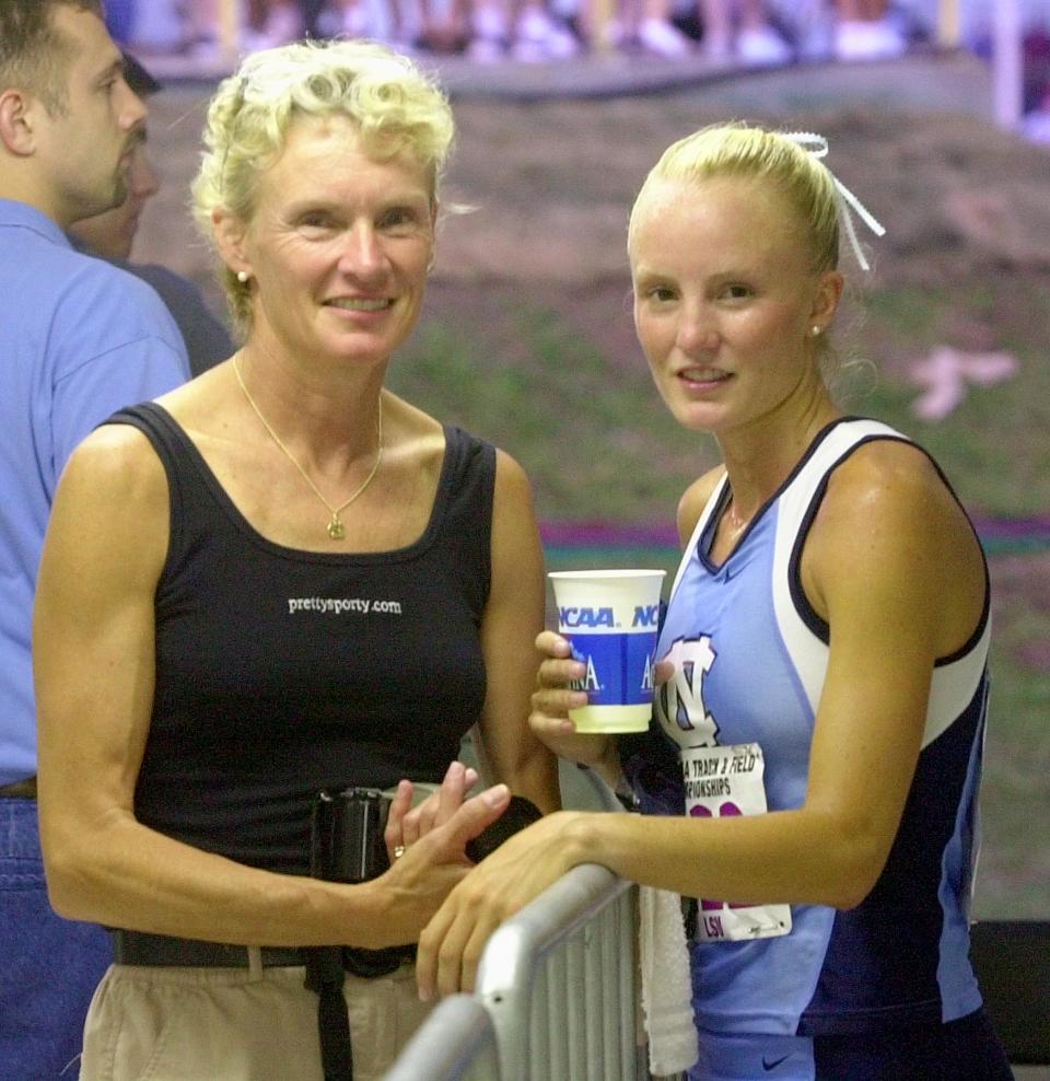 SPECIAL TO INDIANAPOLIS STAR -- Cheryl Treworgy, left and her daughterr Shalane Flanagan pose for a photograph after Flanagan participated in the women's 1500 meter race at the NCAA Track and Field Championships in Baton Rouge, La. Thursday night May 30, 2002. (AP Photo/Bill Haber)