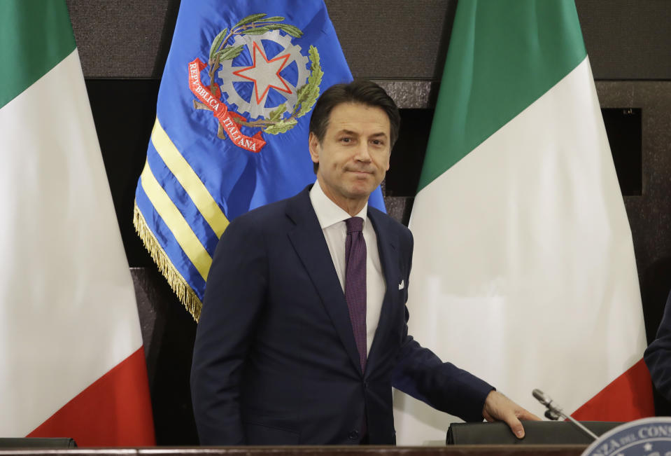 Italian premier Giuseppe Conte arrives for a year end press conference in Rome, Italy, Friday, Dec.28, 2018. (AP Photo/Alessandra Tarantino)