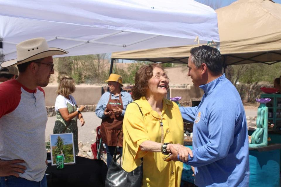 Lt. Gov. Howie Morales (right) and former State Senator Mary Jane Garcia (middle) attend the Doña Ana Village Association's fiesta April 9, 2022.