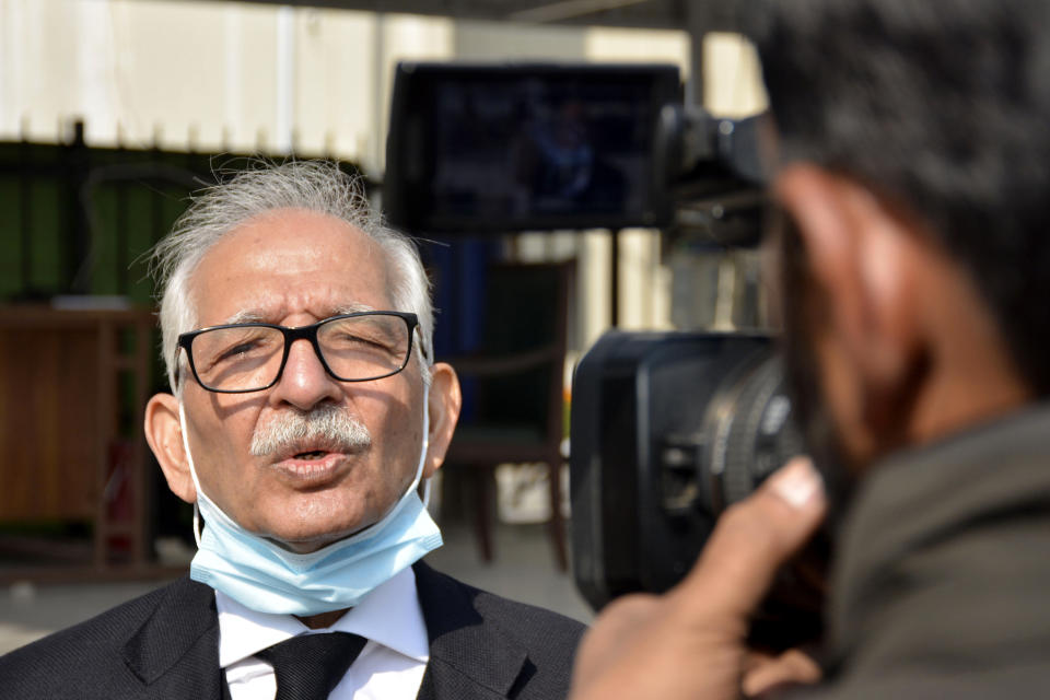 Mehmood A. Sheikh, defense lawyer of British-born Pakistani Ahmed Omar Saeed Sheikh, talks to the media outside the Supreme Court after an appeal hearing in the Daniel Pearl case, in Islamabad, Pakistan, Thursday, Jan. 28, 2021. The court on Thursday has ordered the release of Sheikh convicted and later acquitted in the gruesome beheading of American journalist Pearl in 2002. The court also dismissed an appeal of Sheikh's acquittal by Pearl's family. (AP Photo/Waseem Khan)