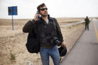<p>Photojournalist Chris Hondros in Libya on April 4, 2011. (Photo courtesy of Nicole Tung) </p>