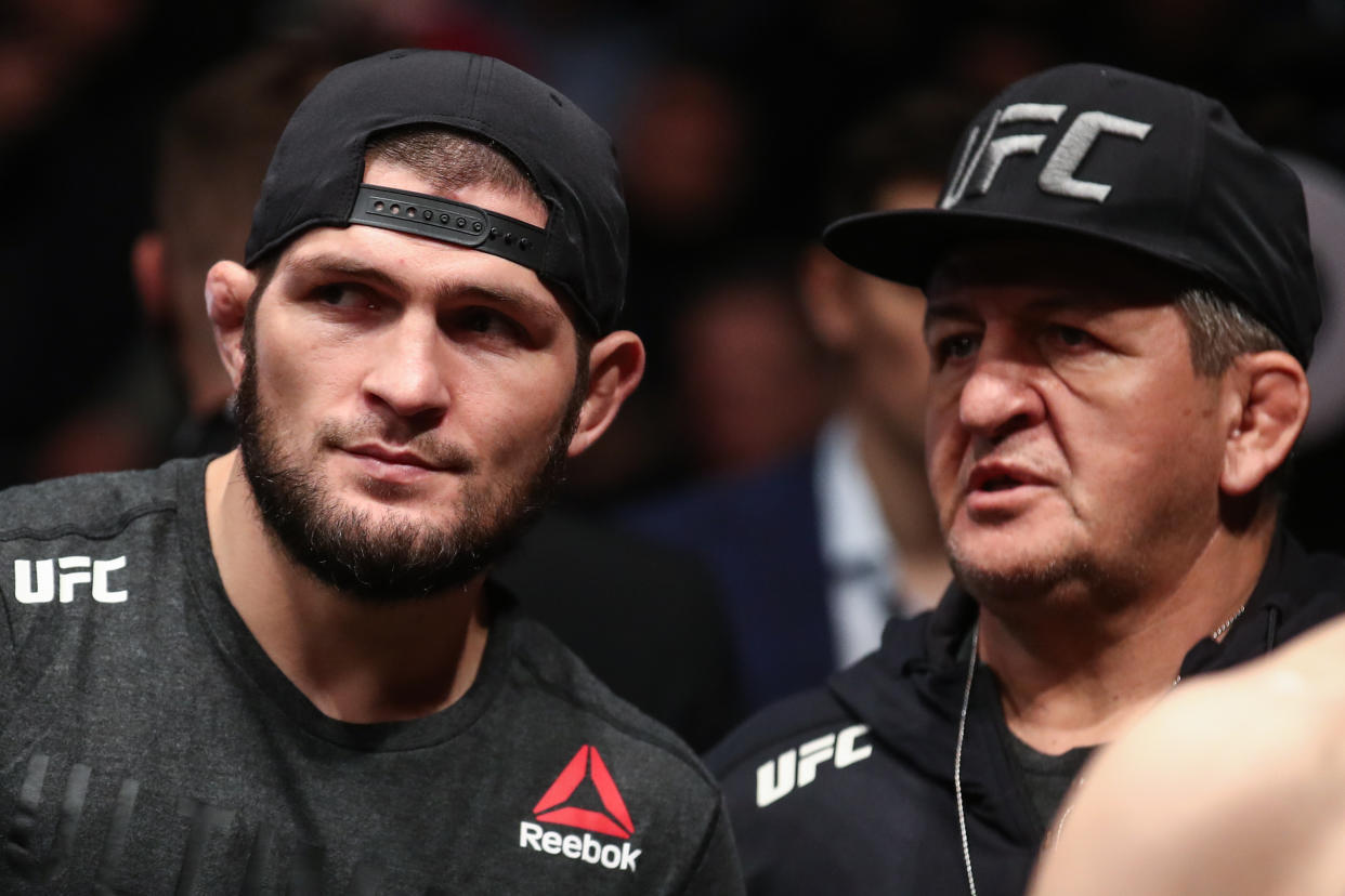 MOSCOW, RUSSIA  NOVEMBER 9, 2019: UFC lightweight champion Khabib Nurmagomedov (L) and his father and coach Abdulmanap Nurmagomedov attend the UFC Fight Night 163 mixed martial arts event, at CSKA Arena. Valery Sharifulin/TASS (Photo by Valery Sharifulin\TASS via Getty Images)