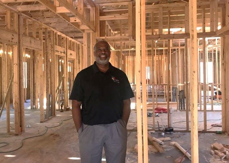 Athens Neighborhood Health Center CEO Marcus Garner stands in the expansion area of the center on Tuesday.