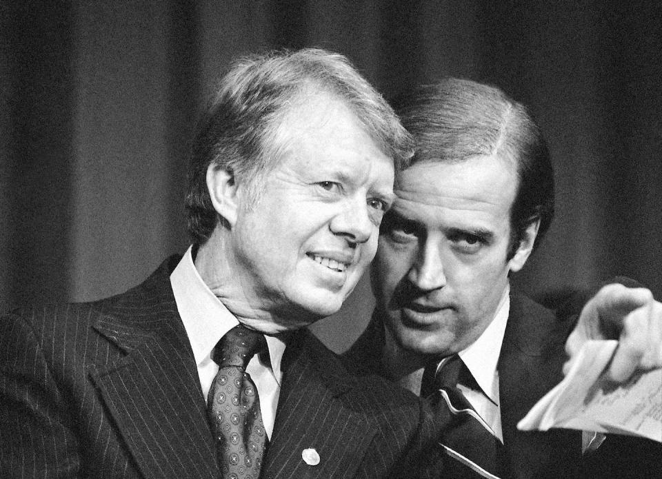 President Jimmy Carter listens to Sen. Joseph R. Biden, D-Del., as they wait to speak at fund raising reception in Wilmington, Del. on Feb. 20, 1978. <a href="https://newsroom.ap.org/detail/BidenAge/3bd495250d1d492b8ebd07def0775f13/photo?Query=jimmy%20carter%20joe%20biden&mediaType=photo&sortBy=arrivaldatetime:desc&dateRange=&totalCount=4&currentItemNo=2" rel="nofollow noopener" target="_blank" data-ylk="slk:AP Photo/Barry Thumma, File;elm:context_link;itc:0;sec:content-canvas" class="link ">AP Photo/Barry Thumma, File</a>