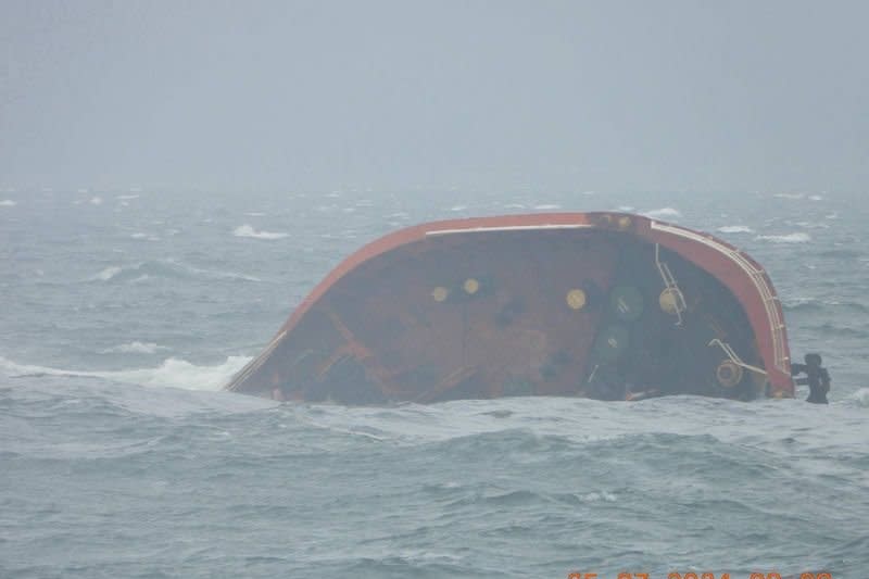 An oil tanker carrying 370,000 gallons of fuel oil sinks in heavy seas in Manila Bay in the Philippines on Thursday. The Philippine Coast Guard rescued 16 of the crew but one remains missing. Colleagues in Taiwan are searching for nine crew members who abandoned a cargo vessel in distress off the south coast of the island. Photo courtesy Philippine Coast Guard/EPA-EFE