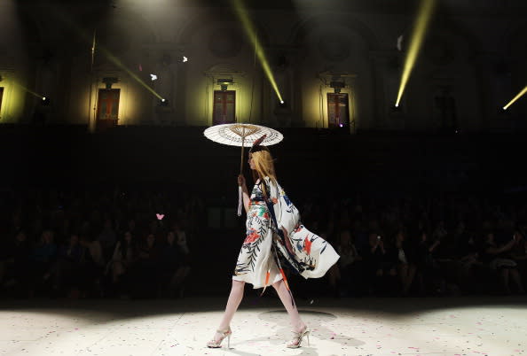 A model showcases designs by Akira on the catwalk as part of Mercedes Benz Fashion Festival Sydney 2012 at Sydney Town Hall on August 23, 2012 in Sydney, Australia. (Photo by Don Arnold/Getty Images)