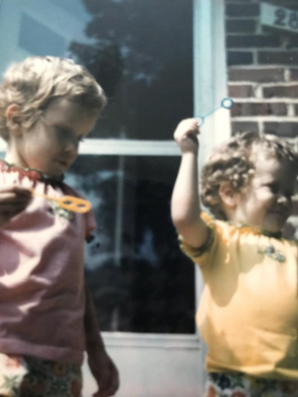 Tasha and Tonya playing together after Tonya's first chemotherapy treatment.