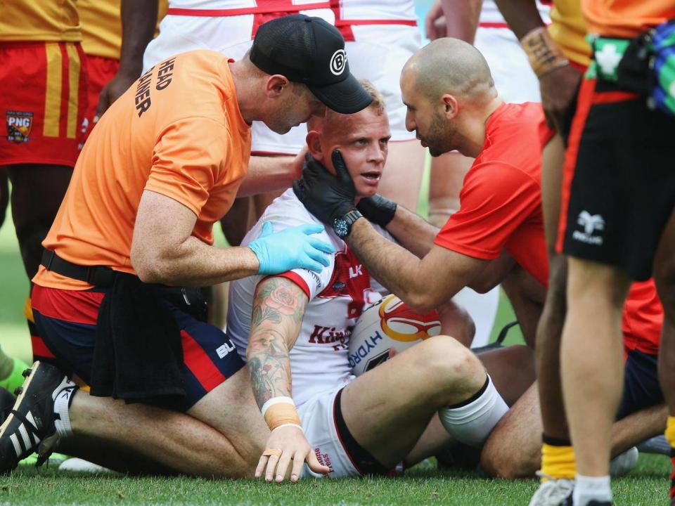 Kevin Brown had to be taken off after a late hit from Watson Boas (Getty)