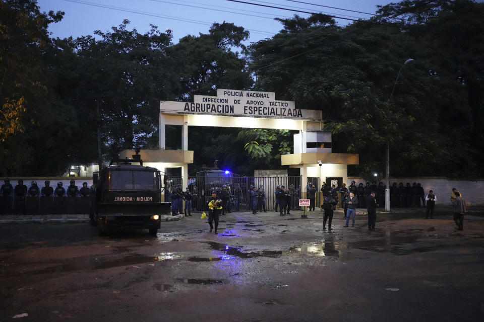 Police guard the Specialized Group building where Paraguayo Cubas, a former presidential candidate, is being held, in Asuncion, Paraguay, Friday, May 5, 2023. Police on Friday detained Cubas, a far-right populist who came in third in Sunday’s presidential election and had alleged without evidence the vote was marred by fraud. (AP Photo/Jorge Saenz)