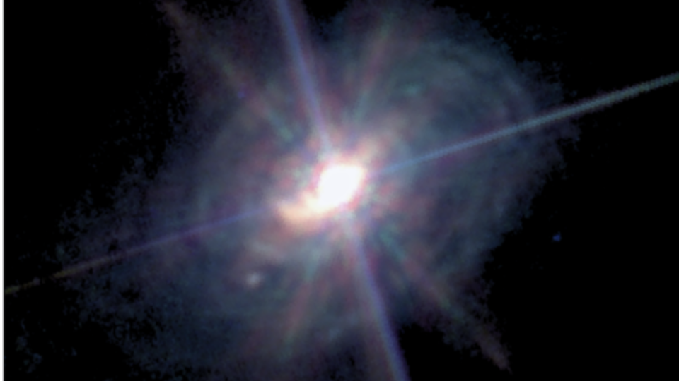     Ein dreifarbiges Bild der Galaxie ESO 428-G14, aufgenommen vom James Webb Space Telescope. 