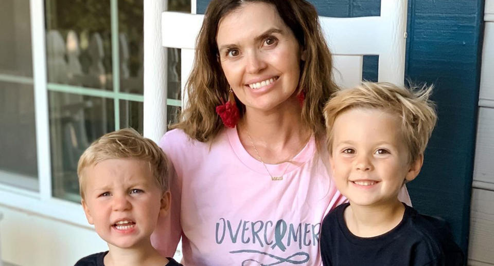 A photo of Jamie Powell with her two children.