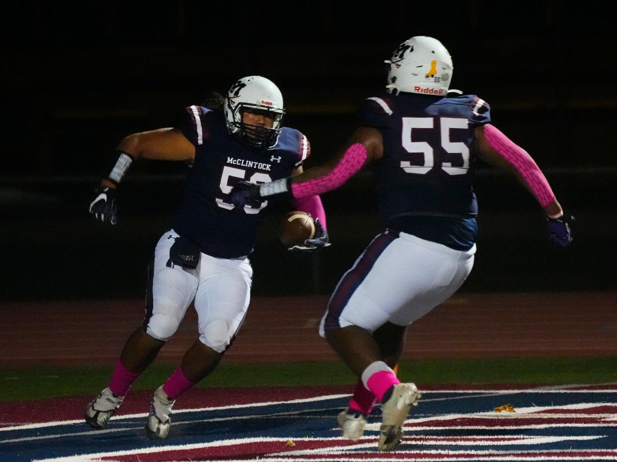 McClintock runningback Jeremiah Latu (59) celebrates a touchdown against Maricopa during a game at McClintock High School in Tempe on Oct. 13, 2022.