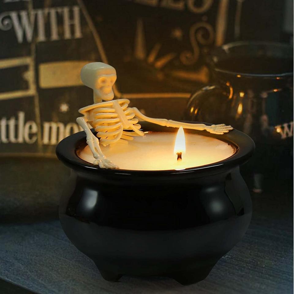 Skeleton takes a bath in this eerie Halloween candle on Amazon.  