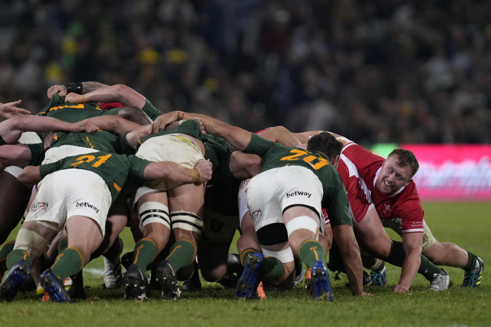 FILE - Wales' Tommy Reffell, far right, watches on during the Rugby Championship test between South Africa and Wales at Free State Stadium in Bloemfontein, South Africa, on July 9, 2022. Warren Gatland is convinced his Wales team will pull off “something special” at the Rugby World Cup. Finding any evidence to back up that bold assertion isn’t easy. (AP Photo/Themba Hadebe, File)