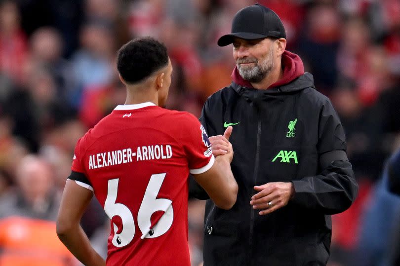 Trent Alexander-Arnold and Jürgen Klopp of Liverpool during the Premier League match between Liverpool FC and Nottingham Forest at Anfield on October 29, 2023 in Liverpool, England.