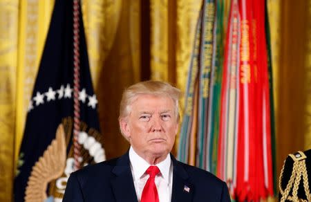 U.S. President Trump awards the Medal of Honor to James McCloughan during a ceremony at the White House in Washington