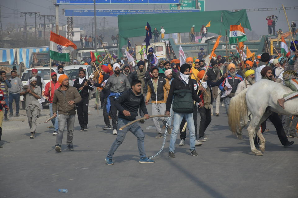 NEW DELHI, DELHI, INDIA - 2021/01/26: Clash between Farmers and Delhi police during Kissan Gantantra Diwas parade from Singhu Border to Lal Kila (Red Fort) in old Delhi during Indian Republic Day. (Photo by Ishant Chauhan/Pacific Press/LightRocket via Getty Images)