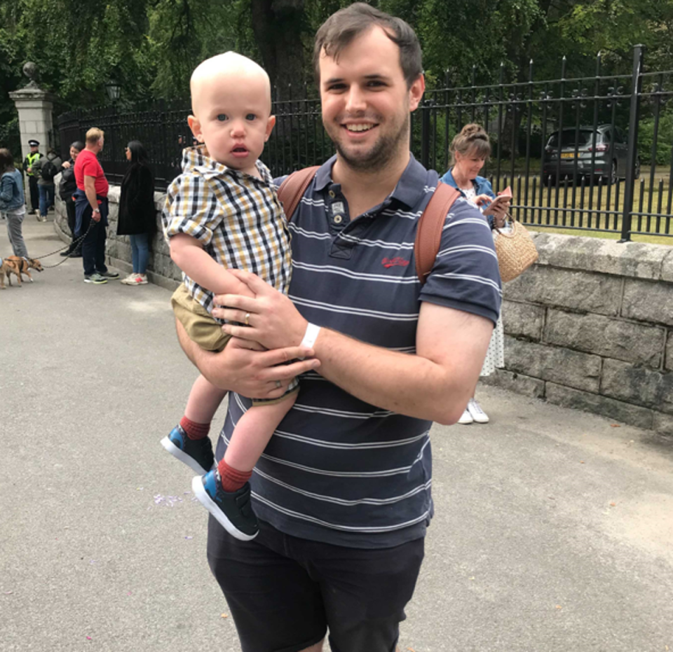 Matthew Roland-Page with his young son Ezra (The Independent)
