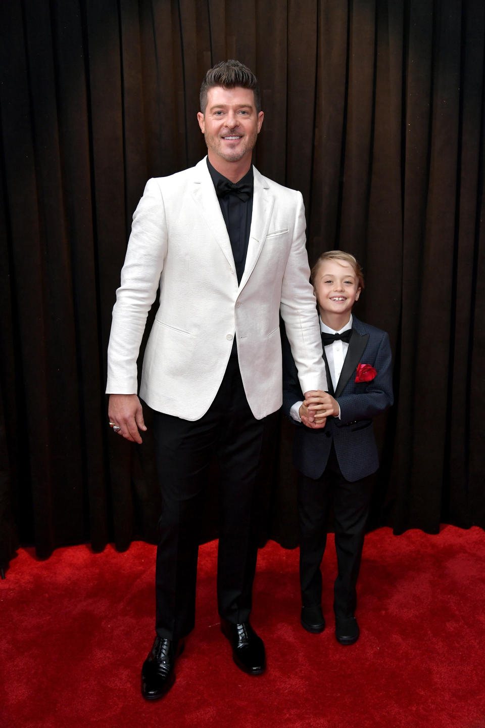 Robin Thicke and his 8-year-old son, Julian Fuego Thicke.