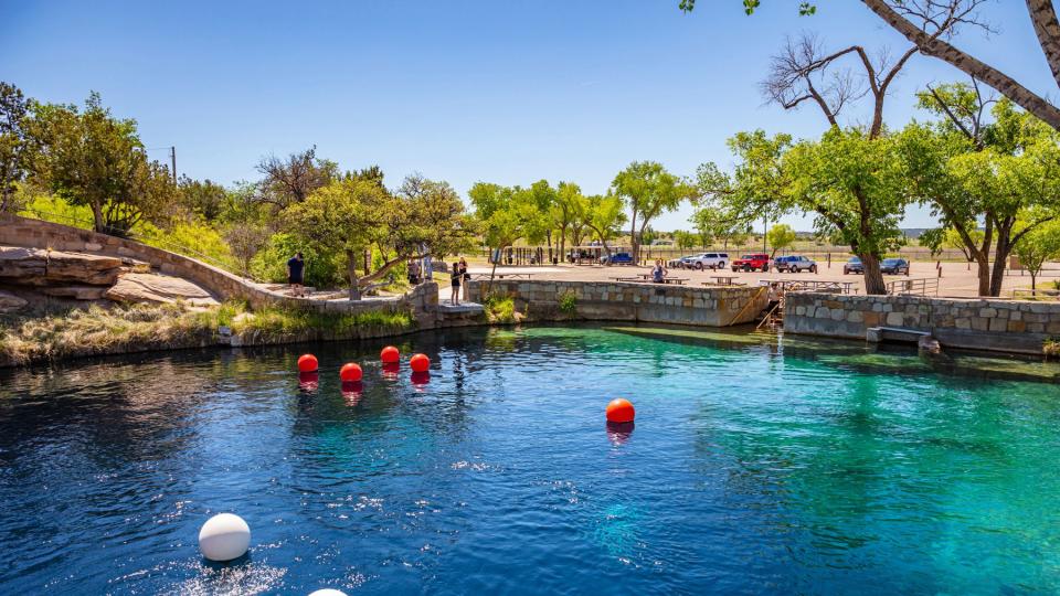 The Blue Hole is a famous deep pool with hidden underwater caves. Santa Rosa, New Mexico, US.