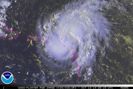 Tropical Storm Gonzalo is seen over the Caribbean Ocean in this NOAA satellite image taken at 16:15EDT (20:15GMT) October 13, 2014. REUTERS/NOAA/Handout