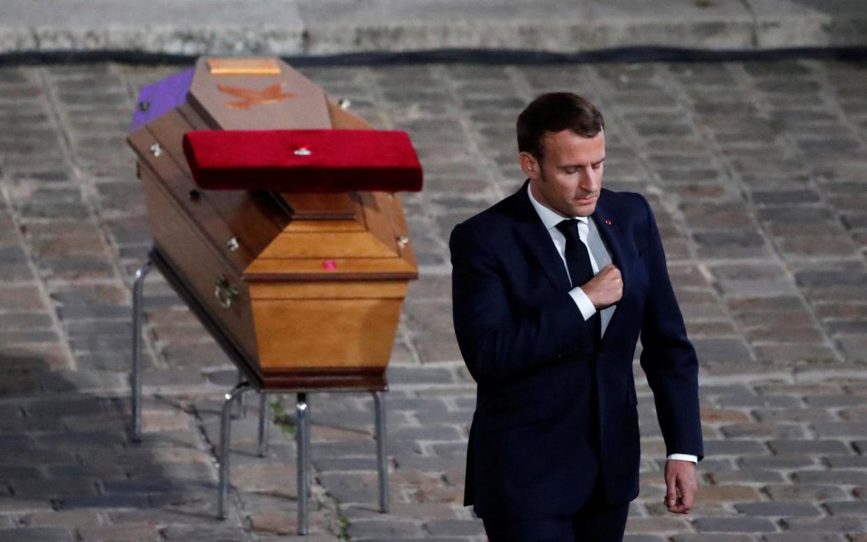 French President Emmanuel Macron paid his respects  - Francois Mori/Pool via REUTERS