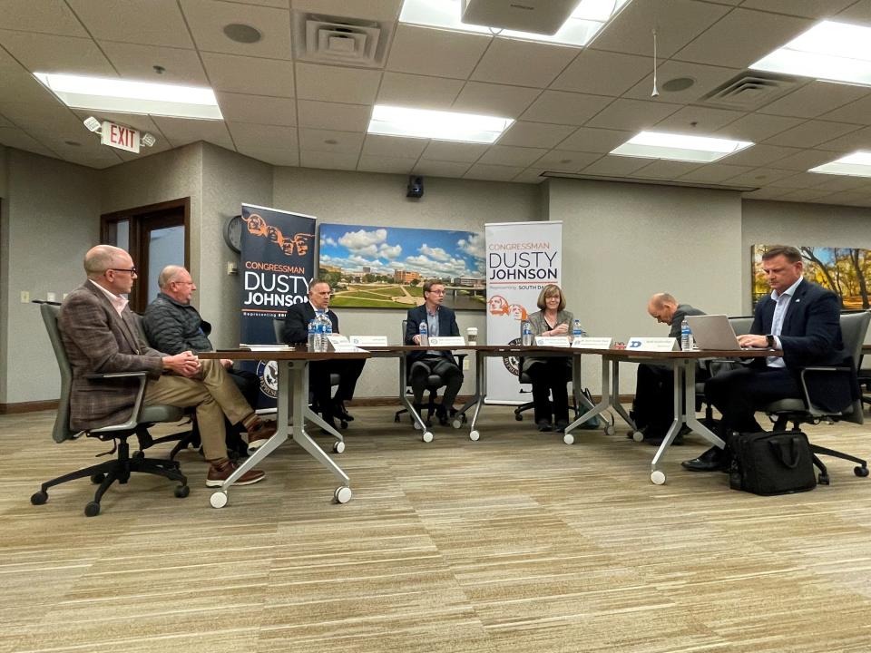 Rep. Dusty Johnson speaks at a roundtable with various business leaders and academics about the impact of China in Sioux Falls on Monday, May 1, 2023.