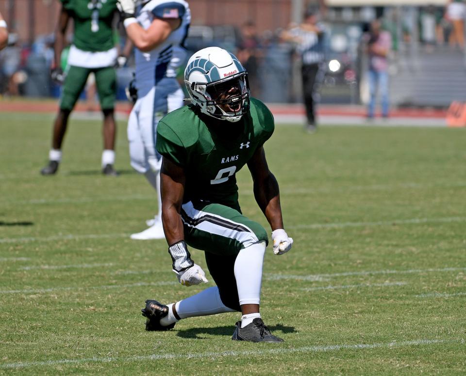 Parkside's Canaan Mapp (8) celebrates his sack on Kent Island Saturday, Sept. 2, 2023, in Salisbury, Maryland.