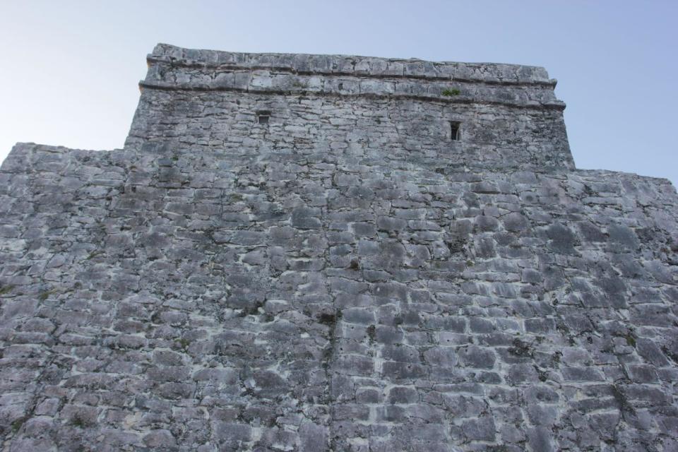 This Jan. 4, 2013, photograph, shows the castle at the Mayan ruins in Tulum, Mexico. Tulum may be best-known for its ancient Mayan ruins, which attract a steady stream of day-trippers, cruise passengers and tour buses. The complex of crumbling structures here is smaller and less impressive than some other Mayan sites like Chichen Itza, but its location atop seaside cliffs is one of the most scenic ruin sites on the Yucatan. (AP Photo/Manuel Valdes)